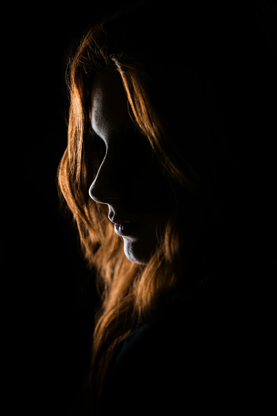 mysterious figure in shadow