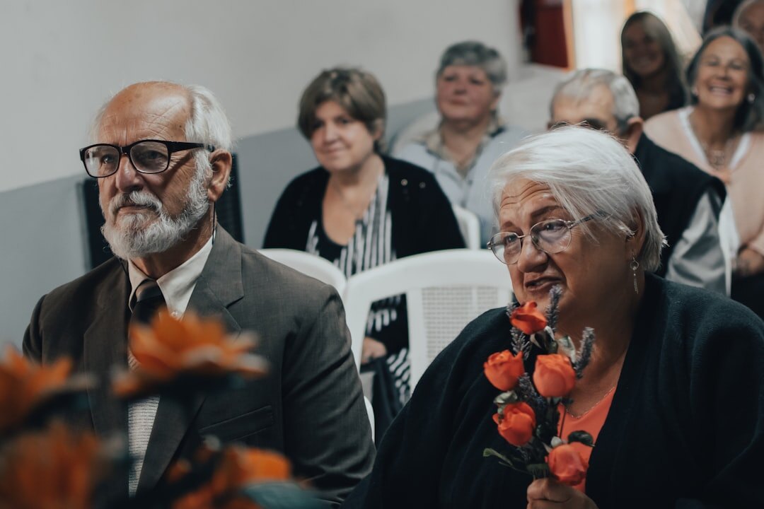 Group of elderly people singing together in a choir