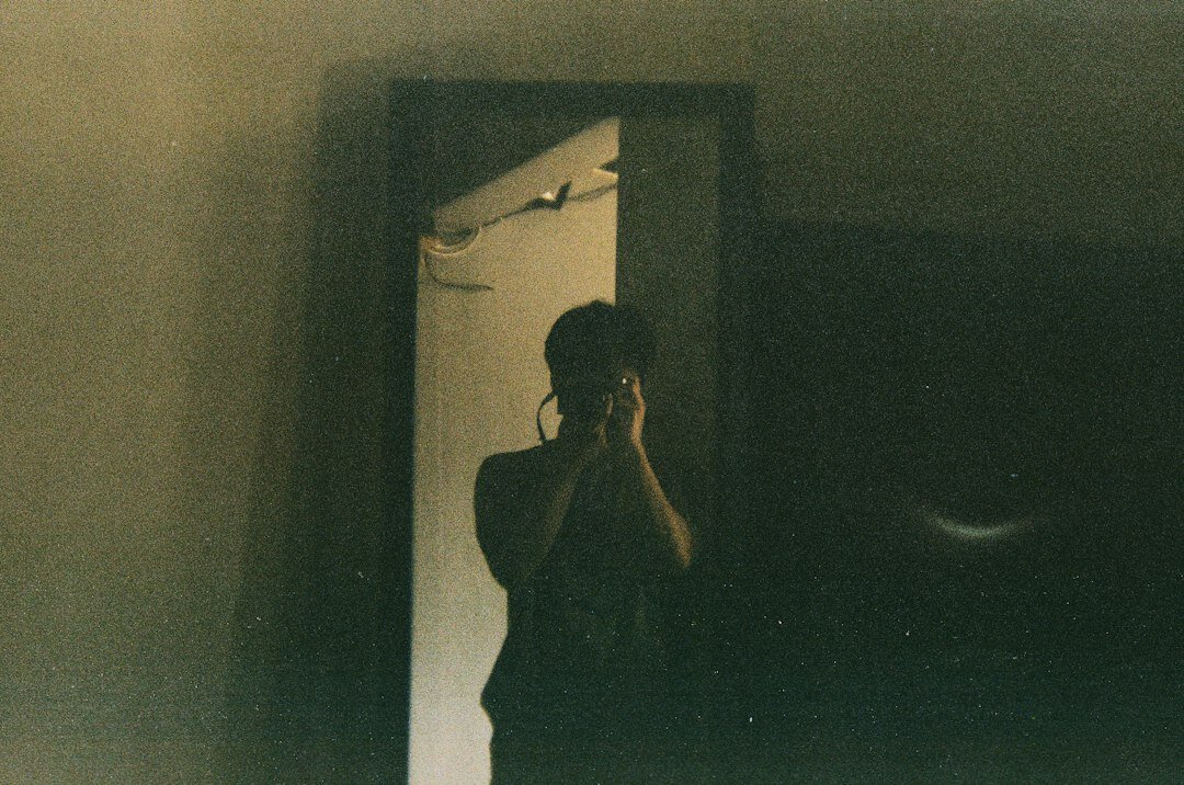 woman facing fear in dark room
